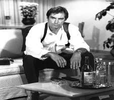 Timothy Dalton consuming alcohol